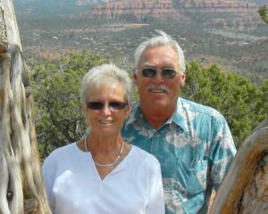 PCM client Jean and her husband on vacation