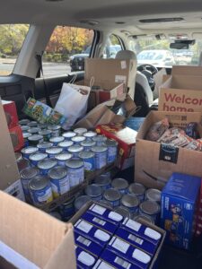 food donations in the back of an SUV