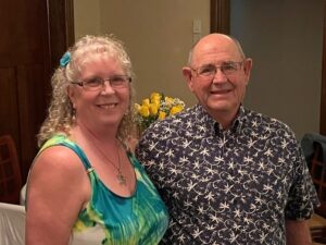woman and man smiling 